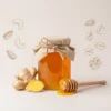 Raw organic Ginger honey in glass jar – infused with natural ginger for health benefits